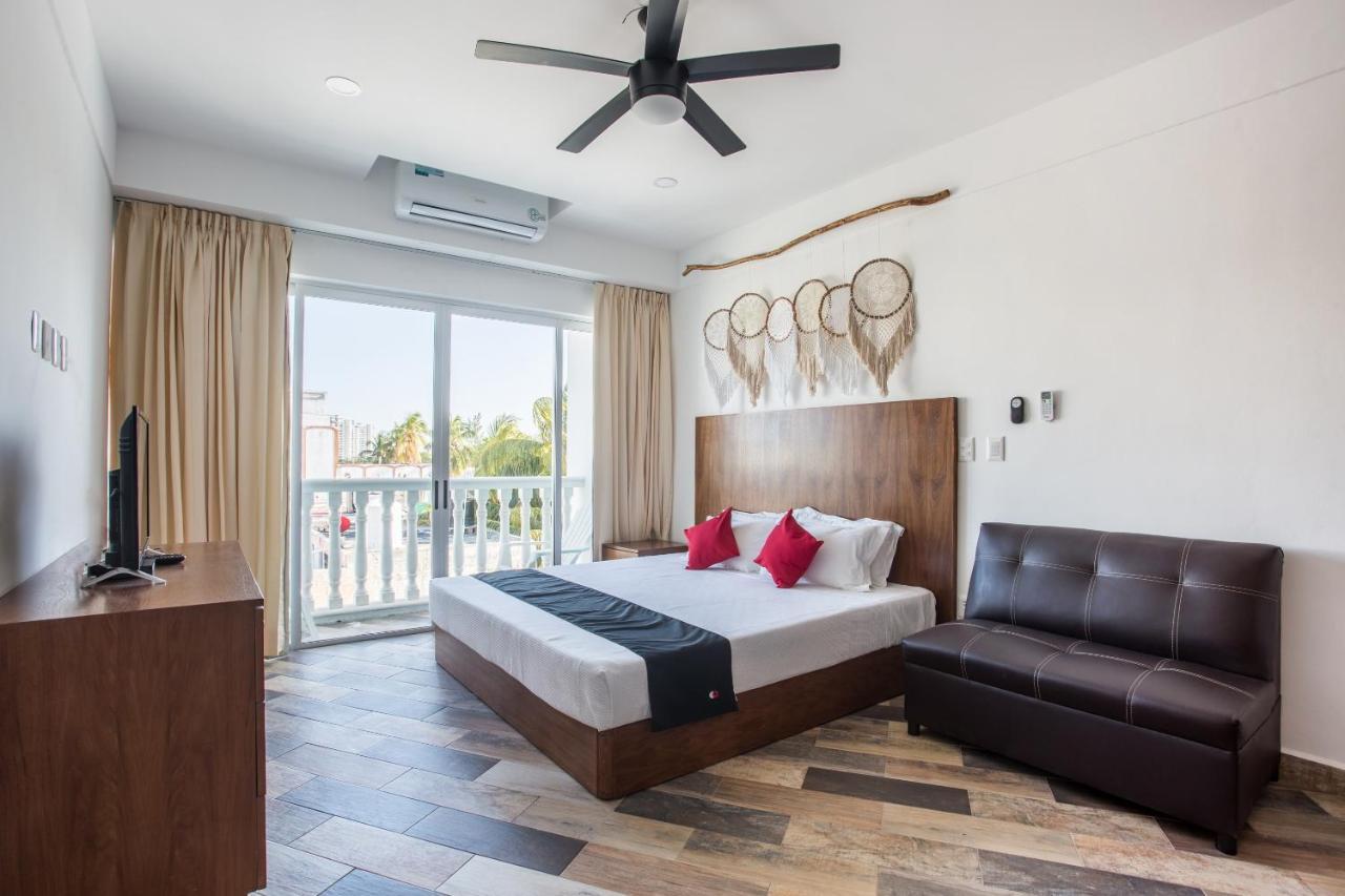 Capital O Cancun Ocean View, Cancún Kültér fotó A typical room at the hotel