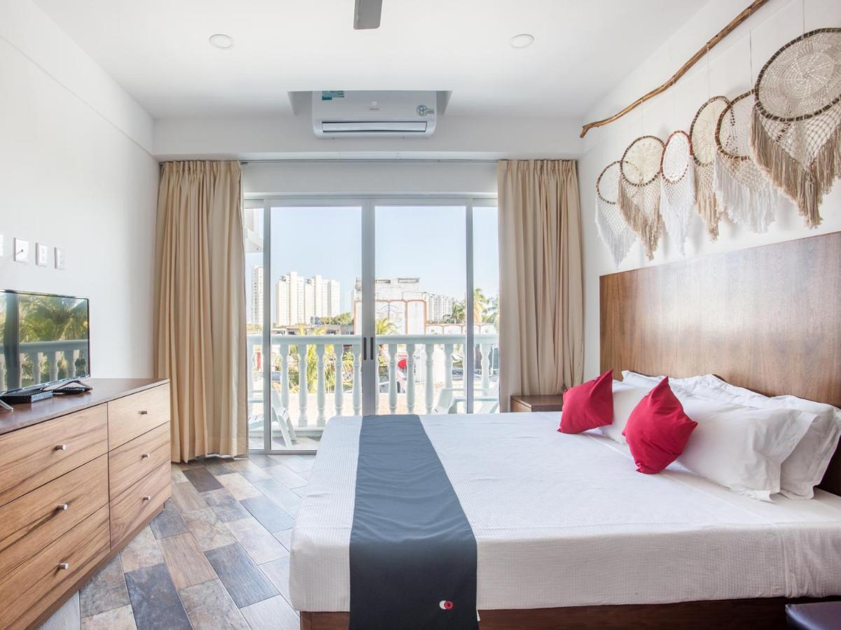 Capital O Cancun Ocean View, Cancún Kültér fotó A bedroom at the hotel