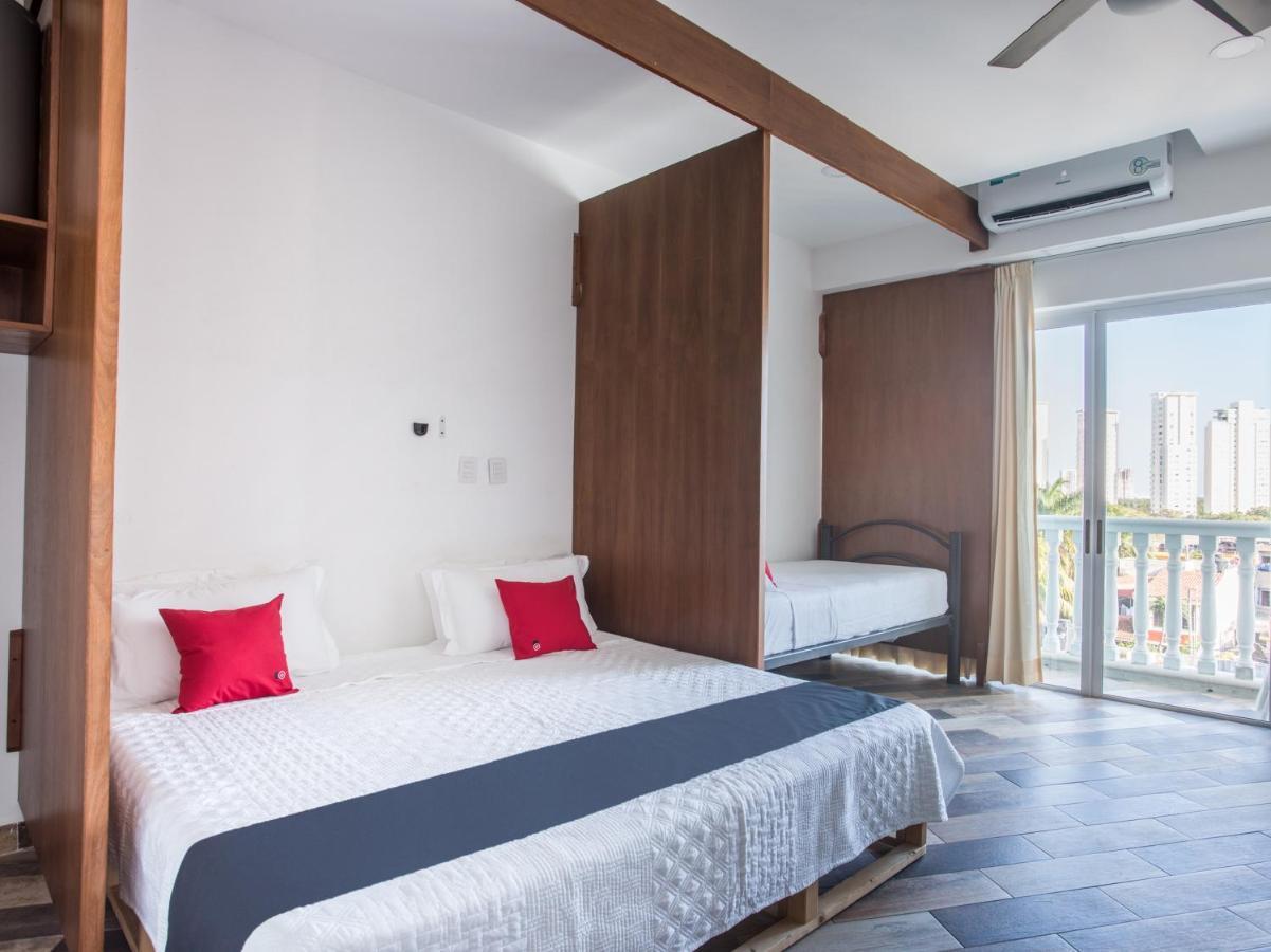 Capital O Cancun Ocean View, Cancún Kültér fotó A bedroom at the hotel